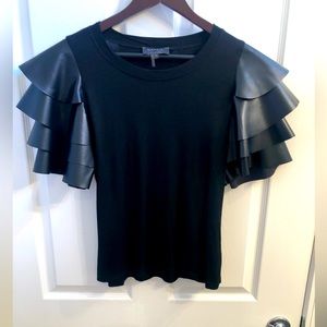 Gracia Ruffle Womens  black short sleeve top with faux leather sleeves. Size L